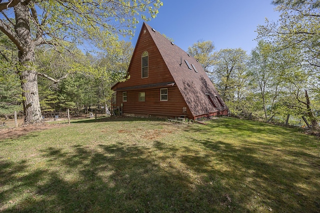 5305 Cisco Ln NE, Remer, MN 56672 - view of property exterior featuring a yard and a shingled roof