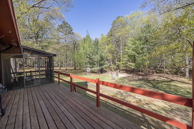 5305 Cisco Ln NE, Remer, MN 56672 - wooden deck featuring a lawn