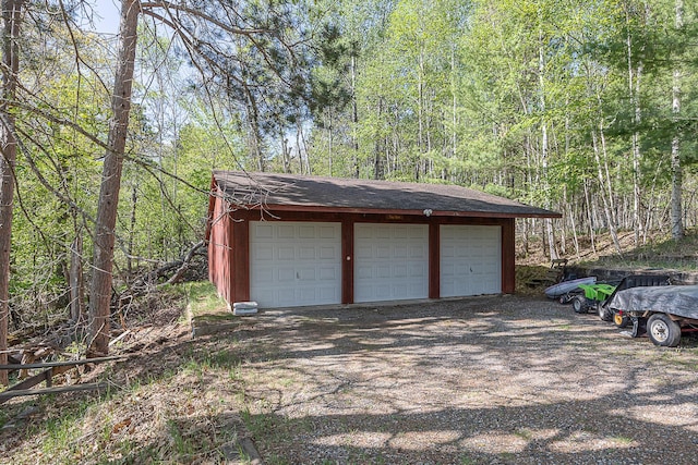 5305 Cisco Ln NE, Remer, MN 56672 - detached garage with a forest view
