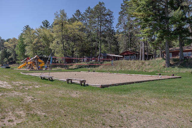 5305 Cisco Ln NE, Remer, MN 56672 - communal playground featuring a yard and volleyball court