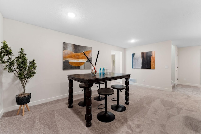 7478 170th Ave NW, Ramsey, MN 55303 - dining room with light colored carpet, baseboards, and recessed lighting