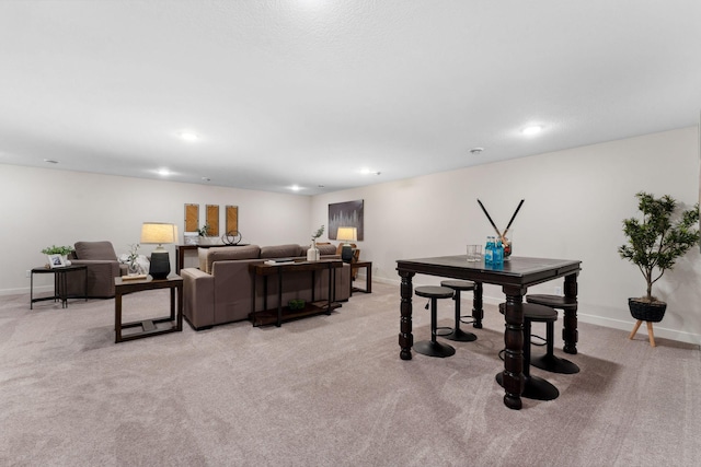 7478 170th Ave NW, Ramsey, MN 55303 - living area featuring baseboards, light colored carpet, and recessed lighting
