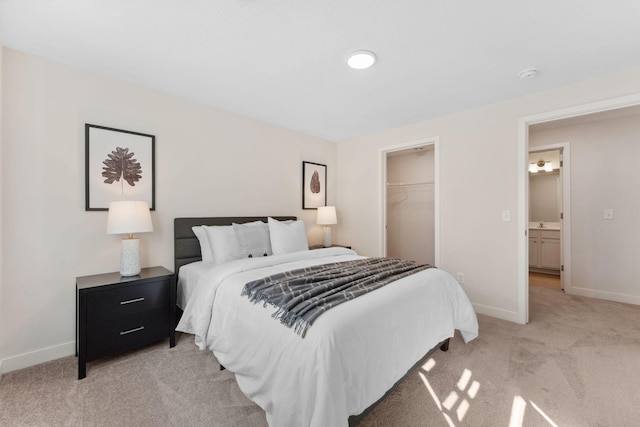 7478 170th Ave NW, Ramsey, MN 55303 - bedroom with light carpet, baseboards, and a closet