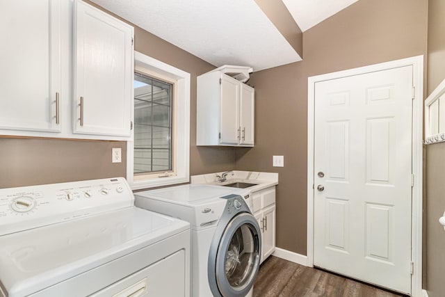1270 145th Ave NW, Andover, MN 55304 - laundry area featuring separate washer and dryer, dark wood-style flooring, cabinet space, and baseboards