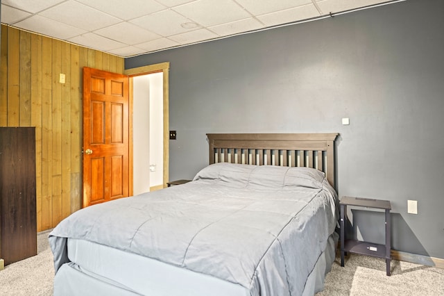 8132 Fillmore St NE, Spring Lake Park, MN 55432 - carpeted bedroom with wooden walls and a drop ceiling