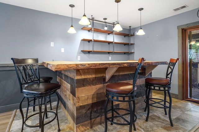 8132 Fillmore St NE, Spring Lake Park, MN 55432 - indoor wet bar featuring pendant lighting