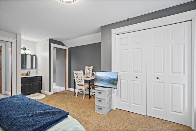 8132 Fillmore St NE, Spring Lake Park, MN 55432 - bedroom featuring carpet, a sink, baseboards, two closets, and vaulted ceiling