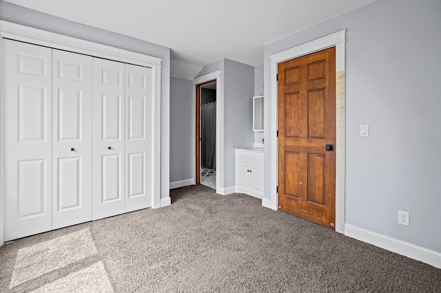 8132 Fillmore St NE, Spring Lake Park, MN 55432 - unfurnished bedroom featuring carpet, baseboards, and a closet