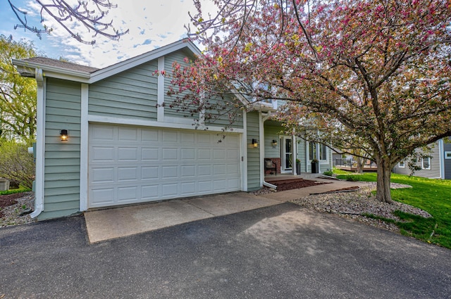 2167 Woodbridge Way, Woodbury, MN 55125 - view of front of home featuring driveway and an attached garage