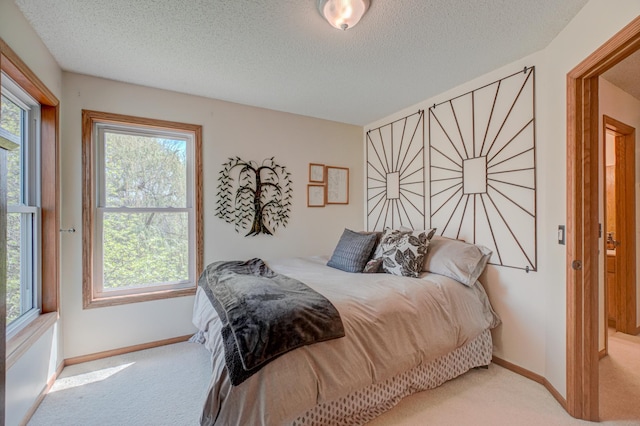 2167 Woodbridge Way, Woodbury, MN 55125 - carpeted bedroom with a textured ceiling and baseboards