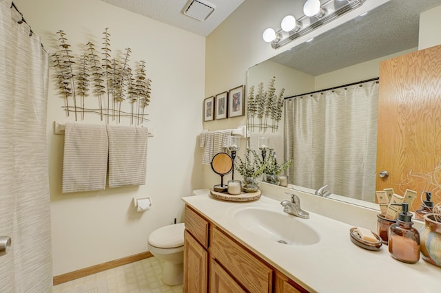 2167 Woodbridge Way, Woodbury, MN 55125 - full bathroom with tile patterned floors, toilet, baseboards, and vanity