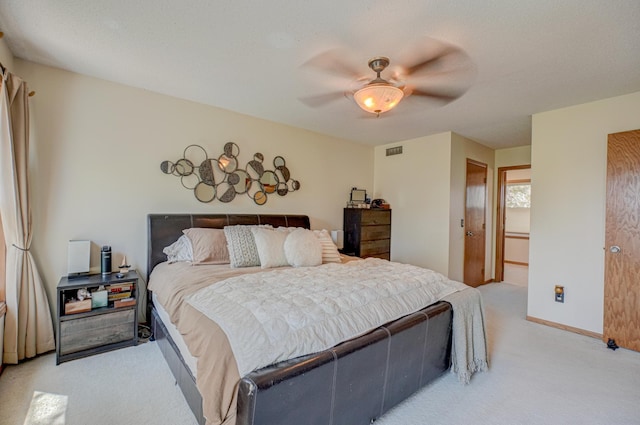 2167 Woodbridge Way, Woodbury, MN 55125 - bedroom with light carpet, baseboards, and ceiling fan