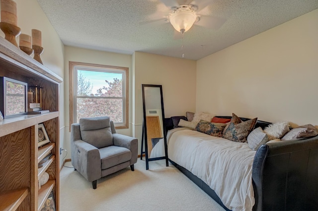 2167 Woodbridge Way, Woodbury, MN 55125 - bedroom with a textured ceiling, light colored carpet, and a ceiling fan