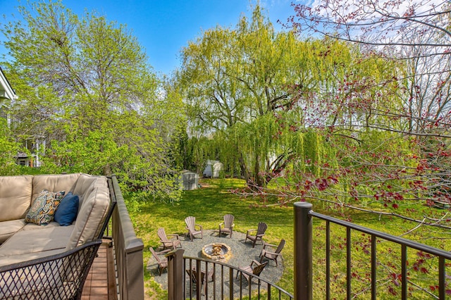 2167 Woodbridge Way, Woodbury, MN 55125 - balcony with an outdoor living space with a fire pit