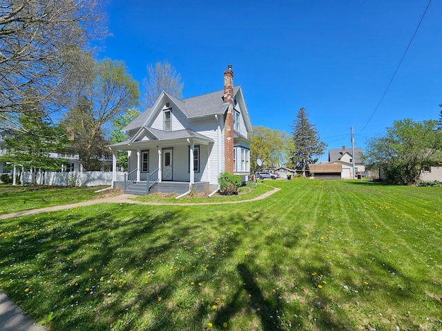 view of property exterior with covered porch and a chimney