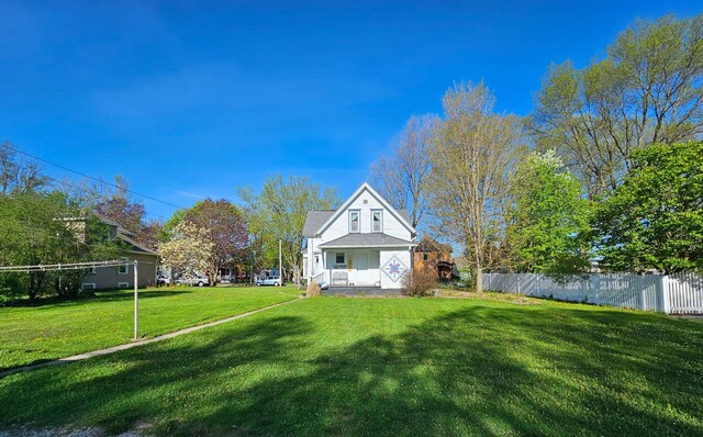 back of house with covered porch