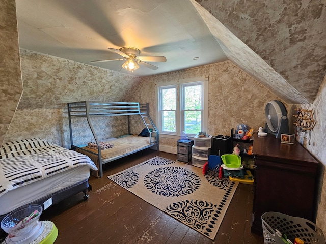 bedroom featuring wood-type flooring and a ceiling fan