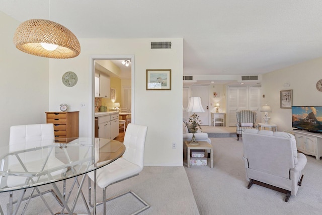 living room featuring light colored carpet