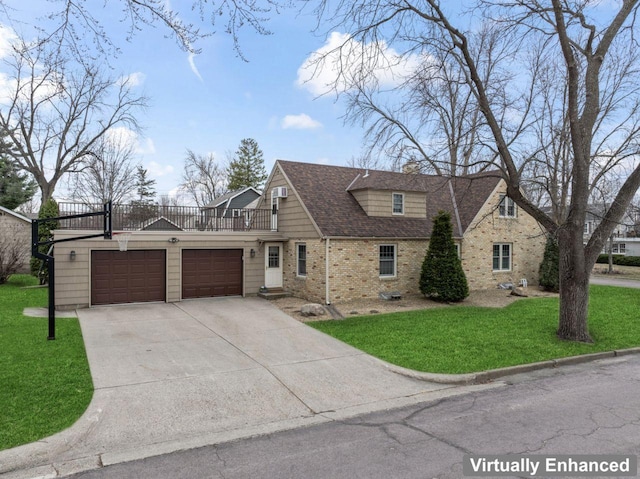 view of front facade with a balcony, an attached garage, a front yard, driveway, and brick siding