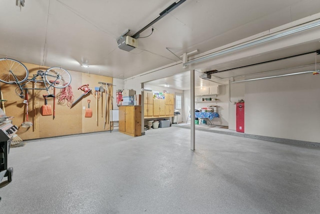 garage featuring a garage door opener