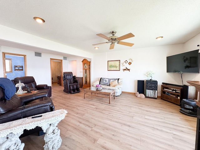49262 Big Pine Rd, Perham, MN 56573 - living room featuring wood finished floors, a ceiling fan, baseboards, and recessed lighting