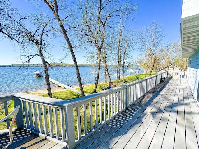 49262 Big Pine Rd, Perham, MN 56573 - wooden deck featuring a water view