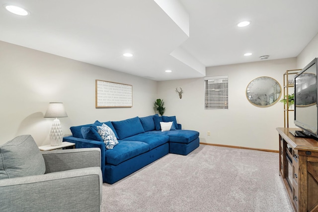 living area with carpet flooring, recessed lighting, and baseboards