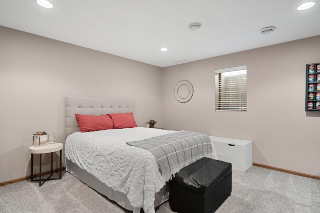 bedroom with light colored carpet, baseboards, and recessed lighting