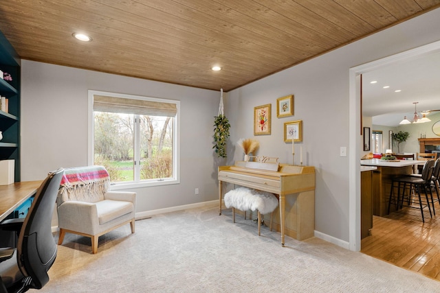 office space with wood ceiling, recessed lighting, baseboards, and light carpet