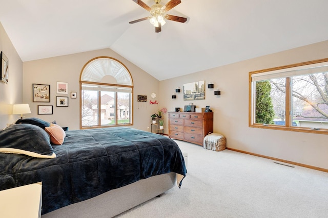 bedroom featuring carpet flooring, lofted ceiling, ceiling fan, and baseboards