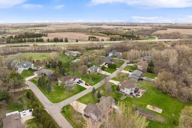 view of property location featuring nearby suburban area