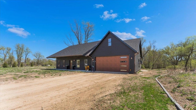 12911 Turtle Lake Ct SW, Lake Mary Twp, MN 56308 - view of home's exterior with driveway and an attached garage