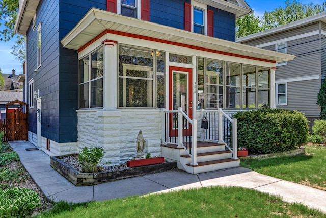 traditional style home featuring a sunroom