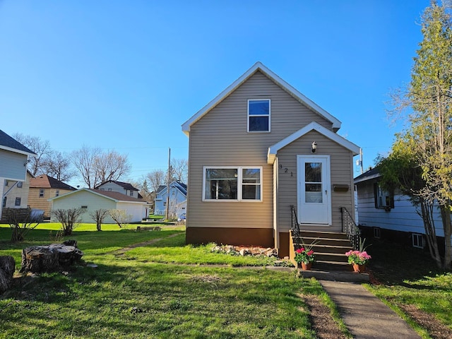view of front of property with a front lawn and entry steps