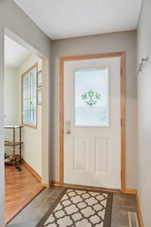 5662 Donegal Dr, Shoreview, MN 55126 - entrance foyer featuring baseboards