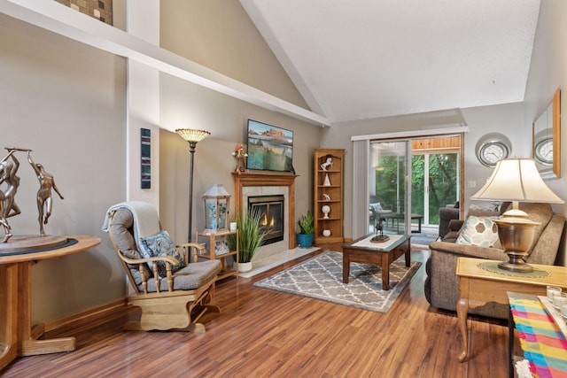 5662 Donegal Dr, Shoreview, MN 55126 - living area featuring high vaulted ceiling, wood finished floors, and a tiled fireplace