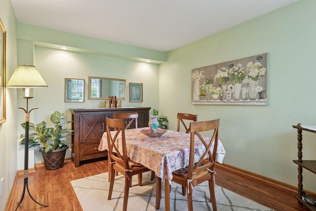 5662 Donegal Dr, Shoreview, MN 55126 - dining area with wood finished floors and baseboards