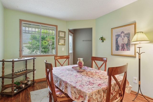 5662 Donegal Dr, Shoreview, MN 55126 - dining area with wood finished floors