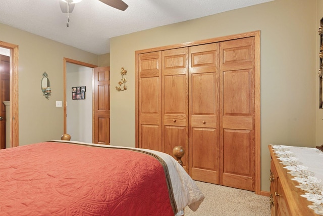 5662 Donegal Dr, Shoreview, MN 55126 - bedroom with carpet, a ceiling fan, and a closet