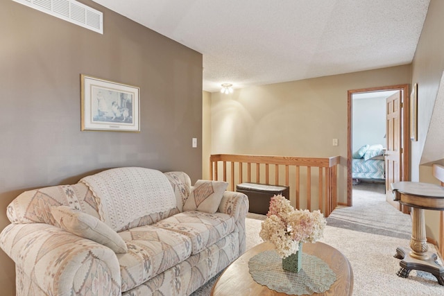 5662 Donegal Dr, Shoreview, MN 55126 - living room featuring a textured ceiling and carpet