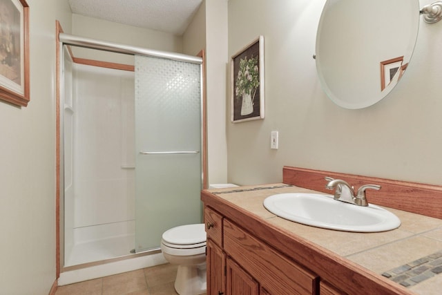 5662 Donegal Dr, Shoreview, MN 55126 - full bath featuring a stall shower, vanity, tile patterned floors, and a textured ceiling
