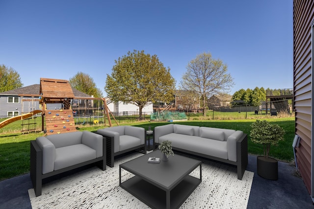 view of patio with a playground and an outdoor hangout area