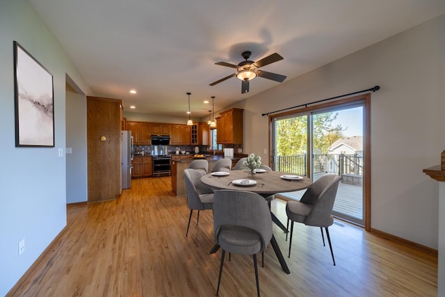 dining room with light wood finished floors, recessed lighting, baseboards, and ceiling fan