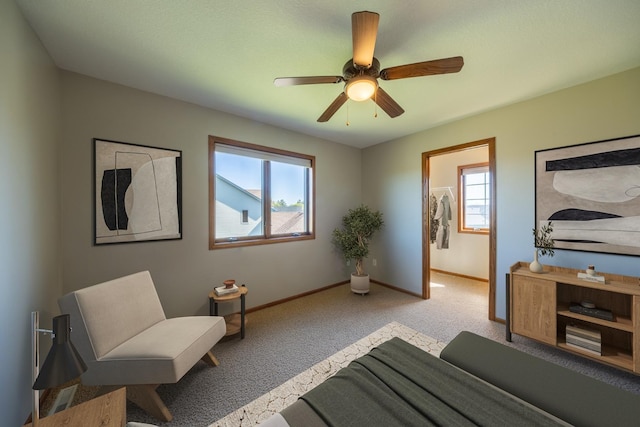 bedroom with baseboards, carpet flooring, and ceiling fan