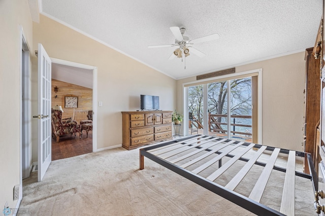24295 Matson Point Trl, Lida Twp, MN 56572 - carpeted bedroom featuring crown molding, lofted ceiling, a textured ceiling, wooden walls, and ceiling fan