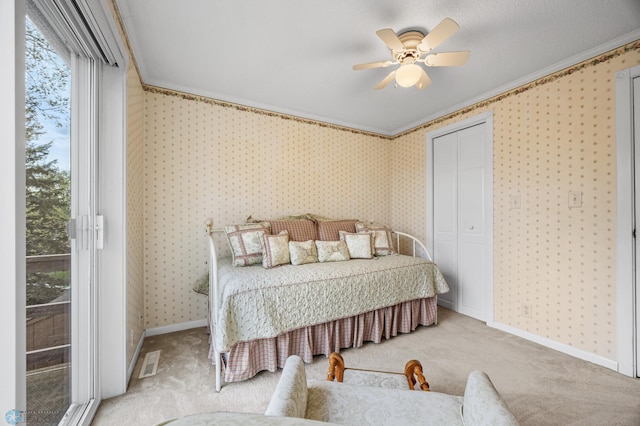 24295 Matson Point Trl, Lida Twp, MN 56572 - bedroom with light colored carpet, wallpapered walls, ornamental molding, baseboards, and ceiling fan