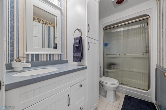 24295 Matson Point Trl, Lida Twp, MN 56572 - full bathroom featuring tile patterned floors, a stall shower, toilet, vanity, and a textured ceiling