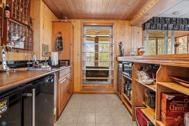 24295 Matson Point Trl, Lida Twp, MN 56572 - kitchen featuring black dishwasher, wood walls, plenty of natural light, wood ceiling, and light tile patterned floors
