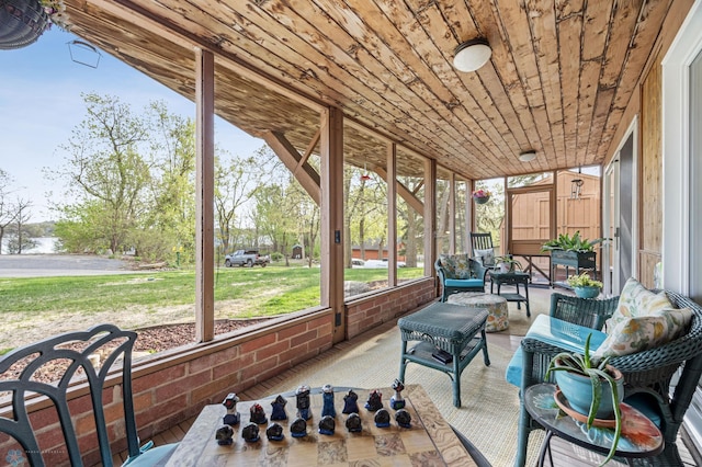 24295 Matson Point Trl, Lida Twp, MN 56572 - sunroom featuring an outdoor hangout area