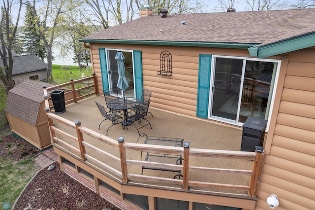 24295 Matson Point Trl, Lida Twp, MN 56572 - wooden deck with outdoor dining area
